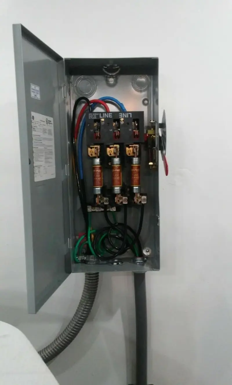 Three-phase disconnect switch installed for Smoke Detector Installation in South Monrovia Island